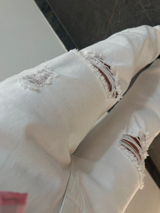Jeans bianco con rotture