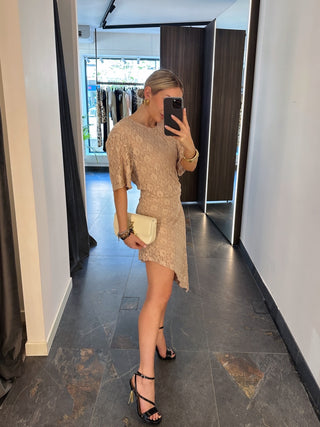 Abito asimmetrico in pizzo nude