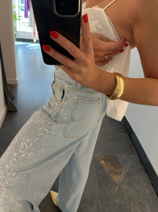 Jeans blu con borchie